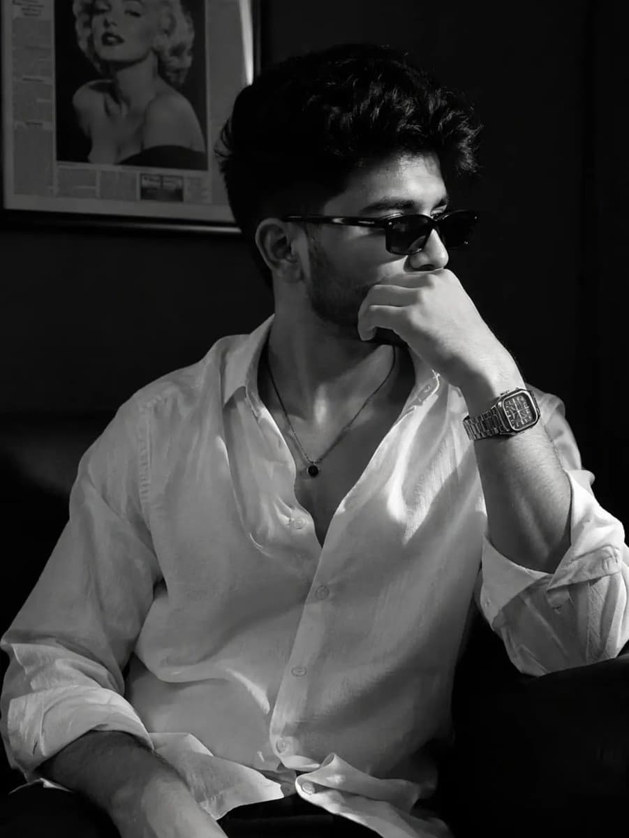 Black and White Luxury Portrait with Sunglasses on Sofa
